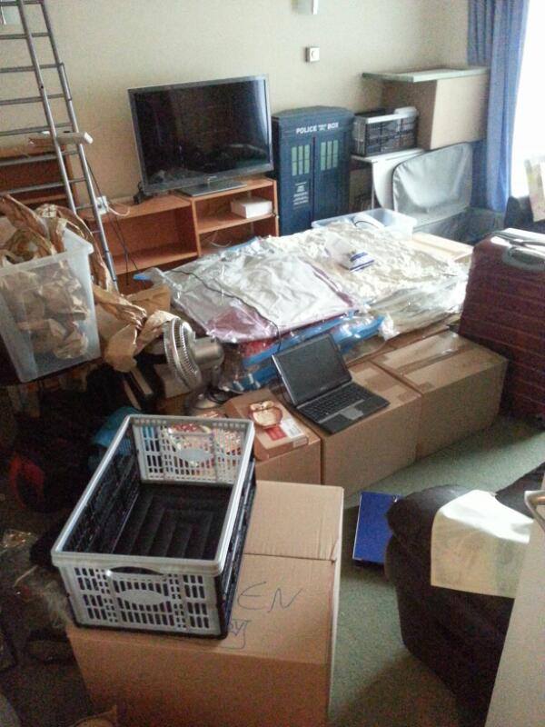 A pile of boxes ready to be removed. Clutter is everywhere.