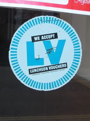 Faded photo in the the window which says "We accept Luncheon Vouchers." Photo by Alex Liivet.