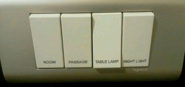 Lightswitches with labels saying which lights they control.