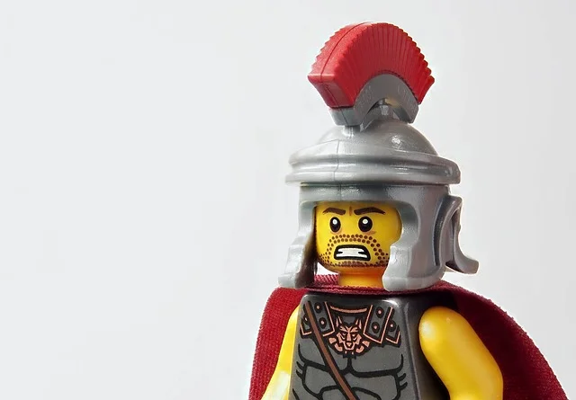 A little Roman Centurion made out of Lego. He is grimacing fiercely.