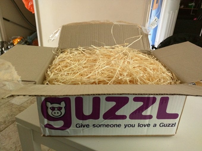 Guzzl box full of straw