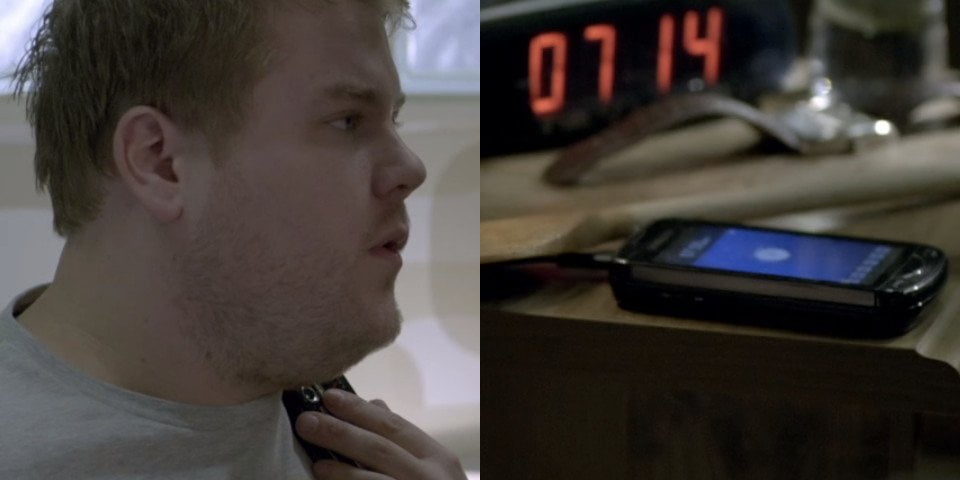 James Cordon holding a phone.