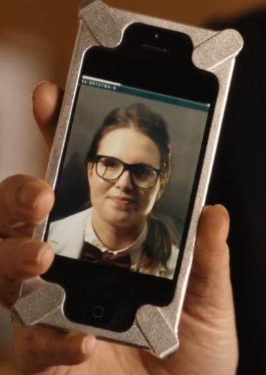 Kate holding photo of Osgood.