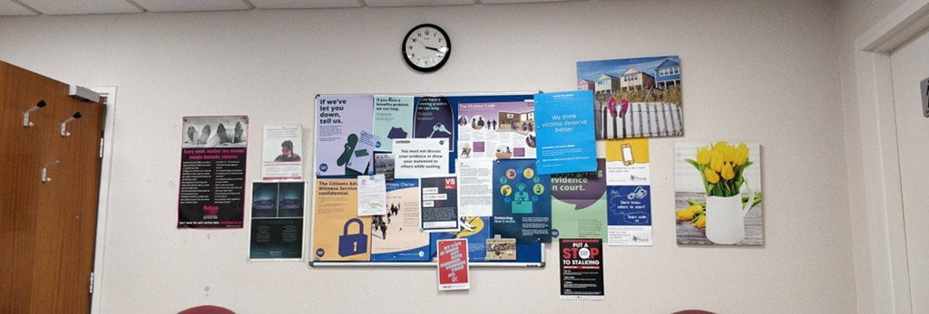 Posters on the wall, telling victims of crime about their rights.