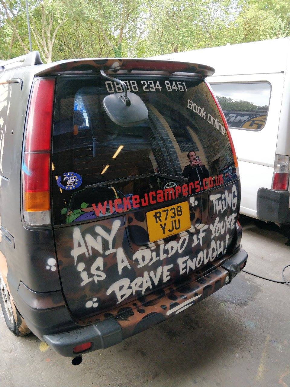 The back of this van says "Anything is a dildo if you're brave enough"!