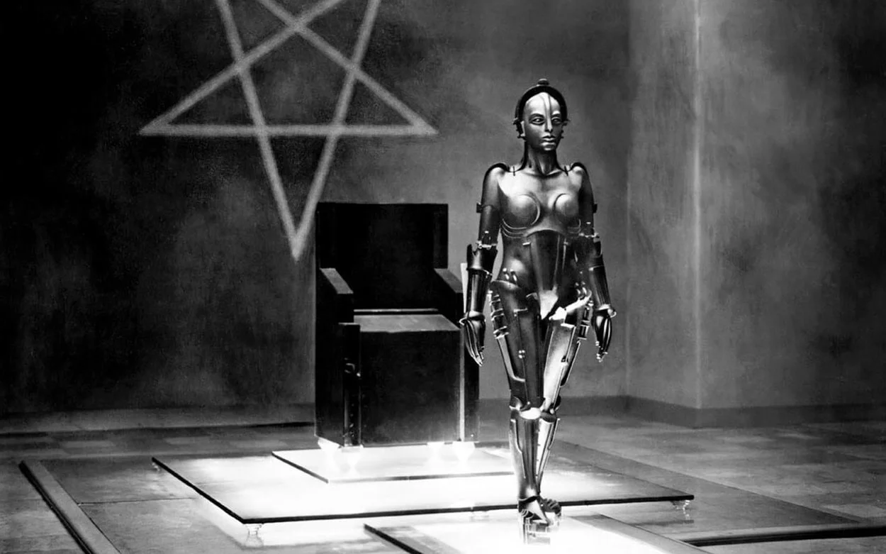 Still from Metropolis. A sexy female robot.