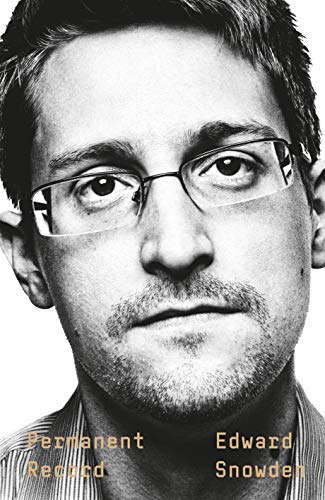 Edward Snowden, a geek in glasses, looks away from the camera.