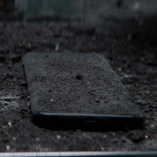 A dust covered phone.