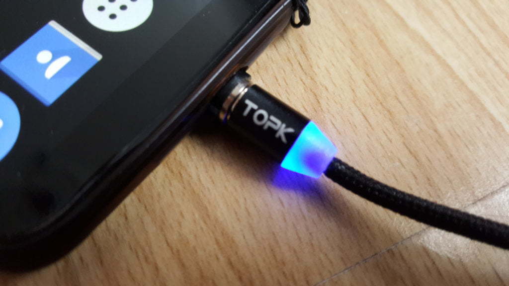 A straight connector with a Glowing blue LED.