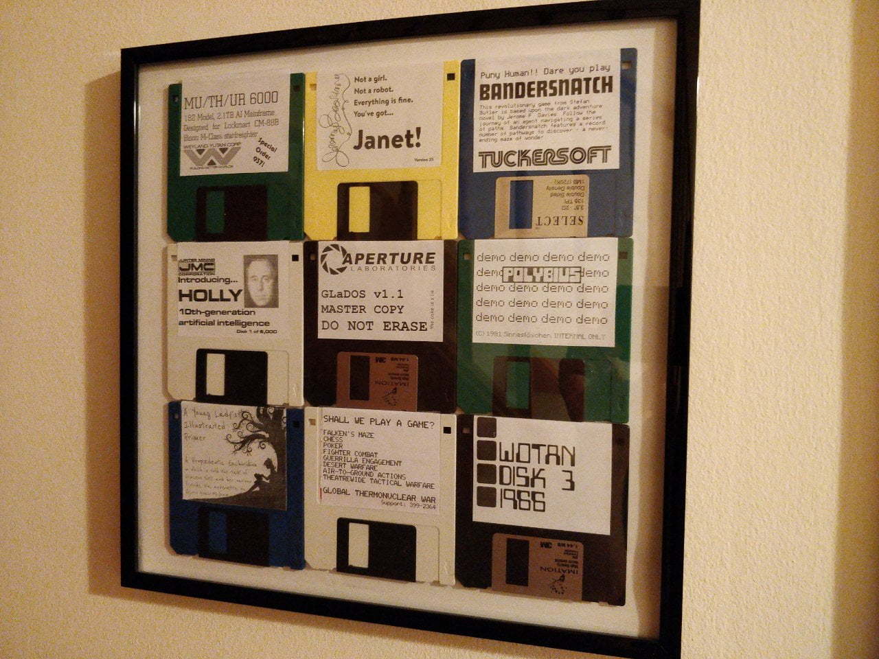Colourful floppy disks in a frame.