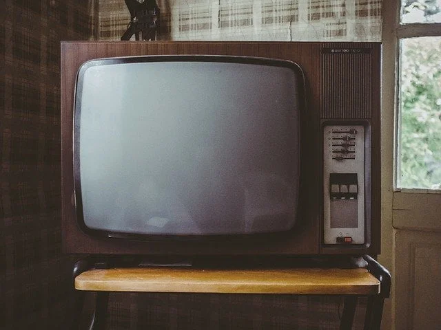 An old fashioned CRT TV. It is blank.