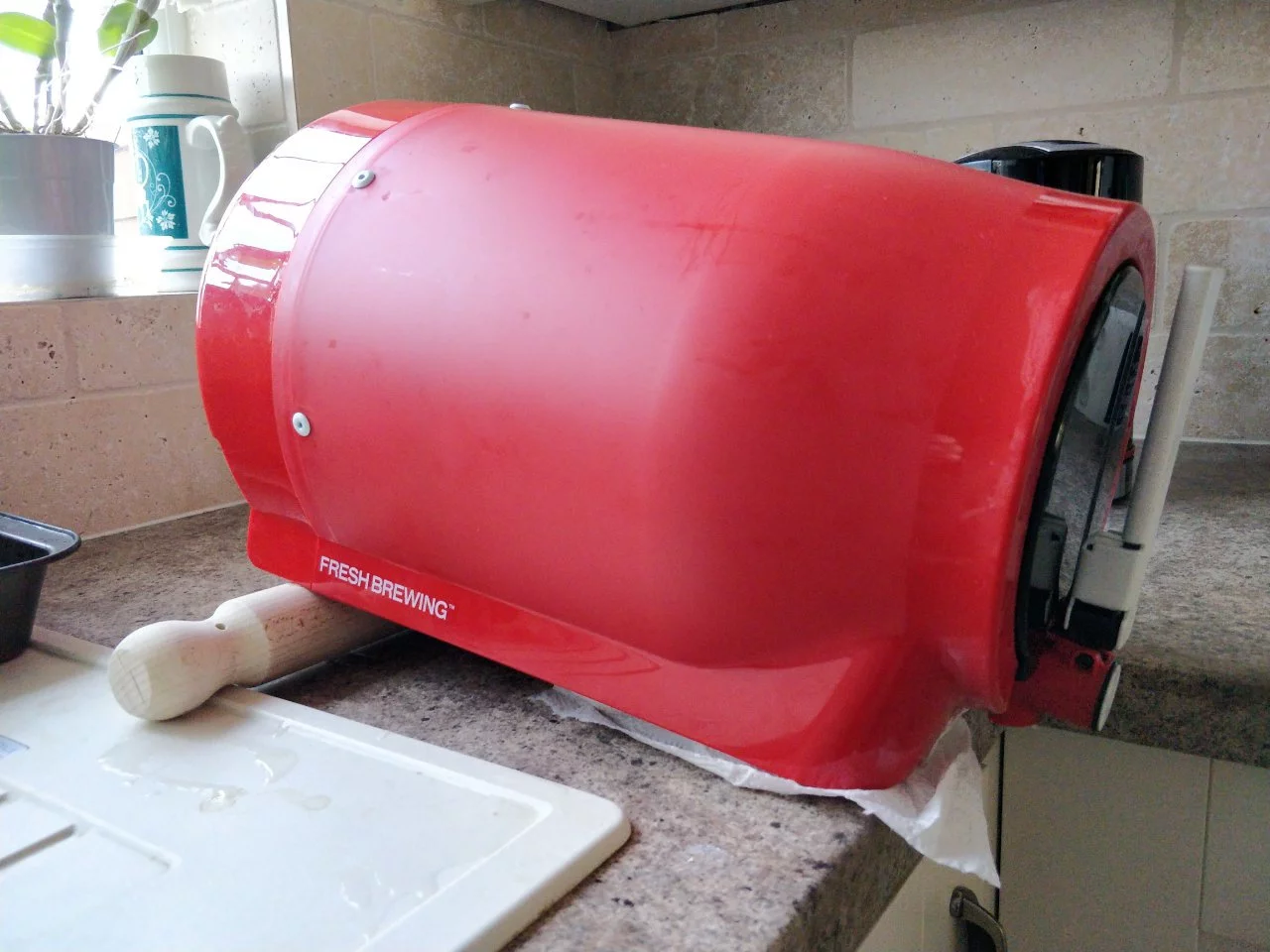 Barrel propped up on a rolling pin.