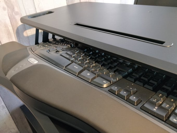 Keyboard covered by overhang.