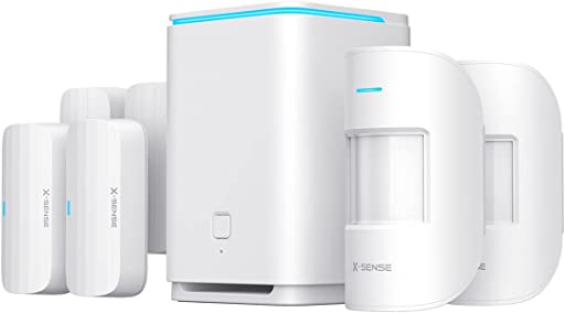 X-Sense products - a hub, two motion sensors, and four open / closed sensors. All in white.