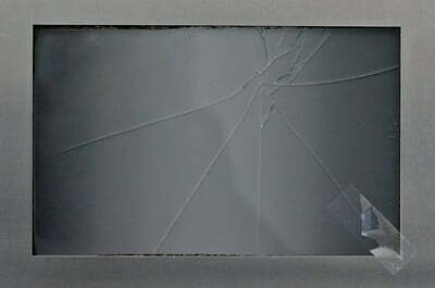 Photo of a broken and smashed picture frame. Taken by eastbeach on Flickr.