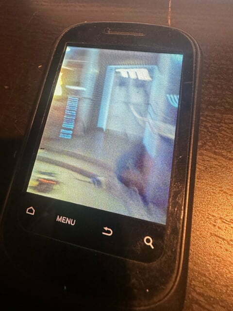 Photo of a phone showing a photo of the Interior of the  TARDIS.