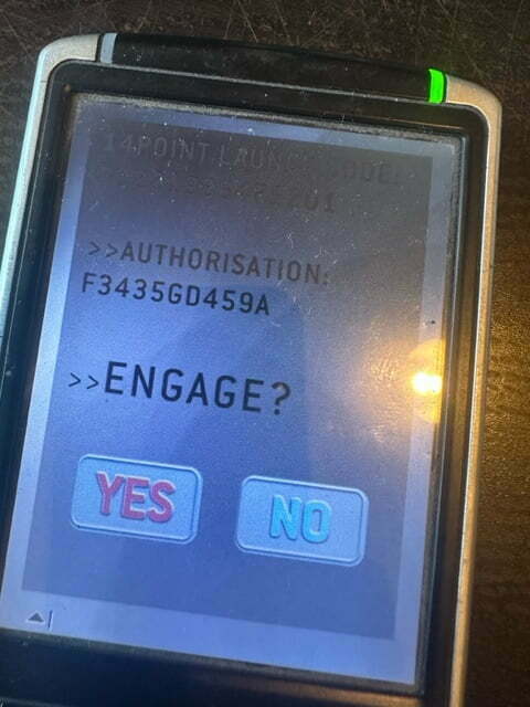 PDA displaying "14 point launch code. Engage, yes, no."