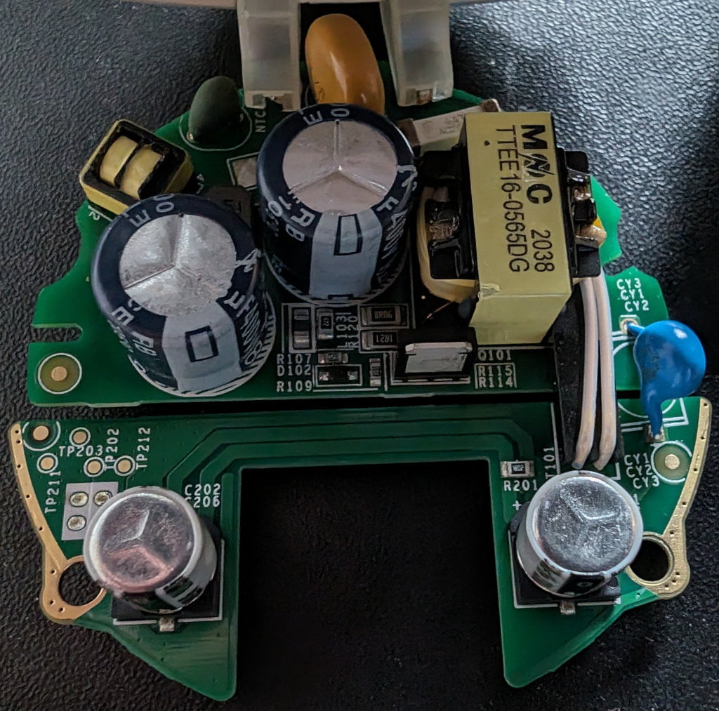 A circuit board with lots of capacitors.