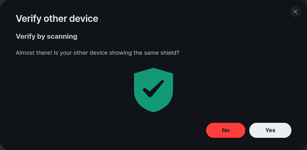 Text reads "Verify other device. Verify by scanning. Almost there! Is your other device showing the same shield?" Image is of a Green Shield with a grey tick.