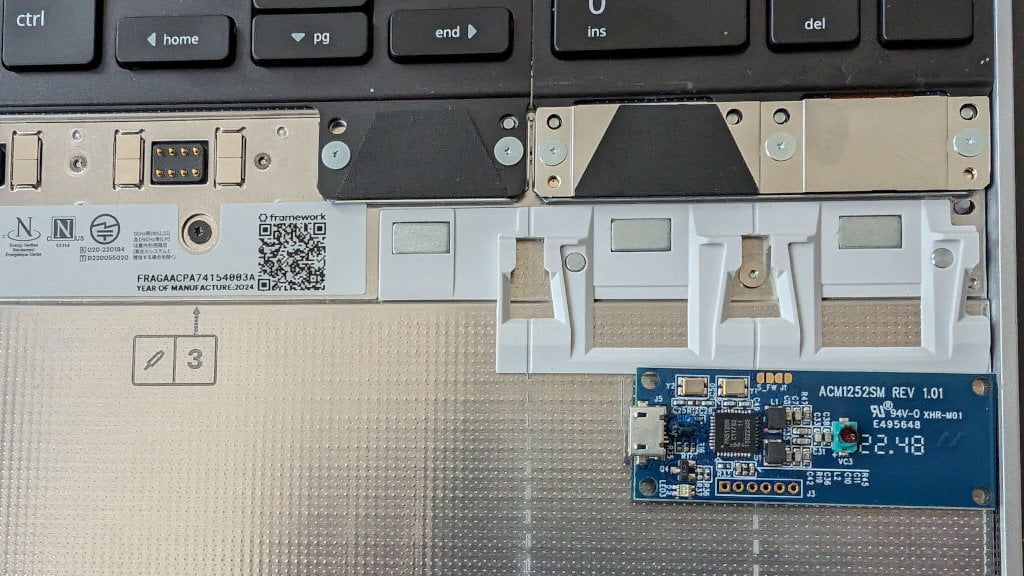 Circuit Board horizontal in laptop.