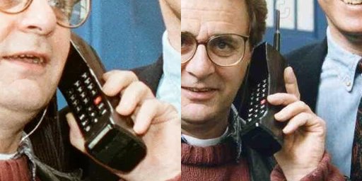 Detail of McCoy holding a brick phone.