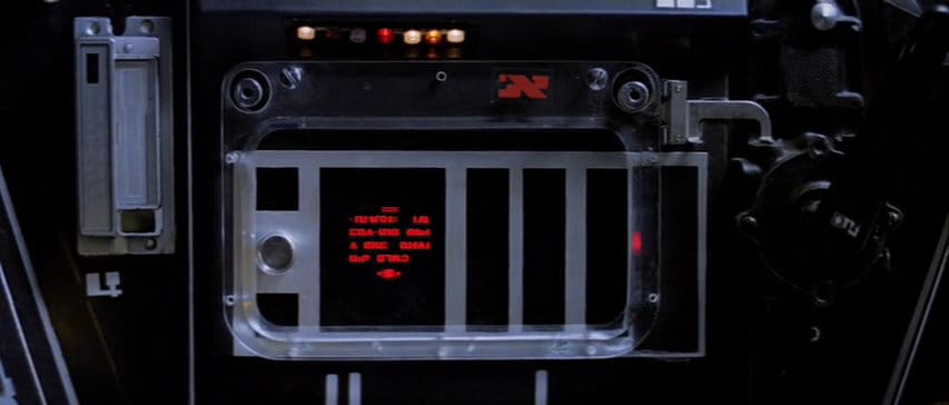 Screenshot from Empire. A digital display with red writing.