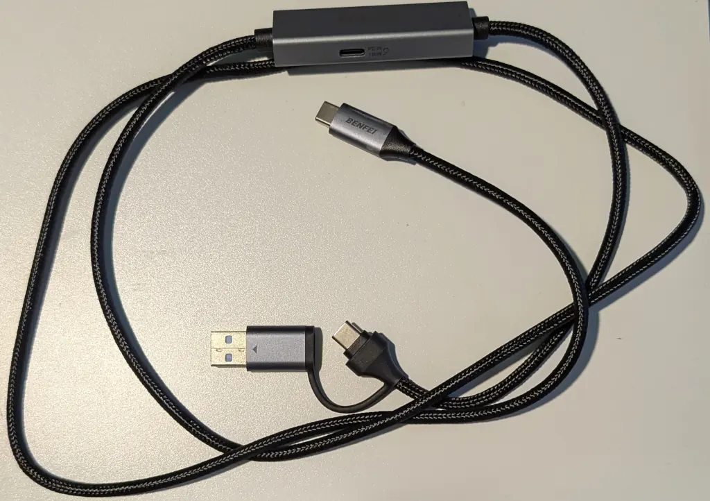 A long USB-C cable with a box in the middle.