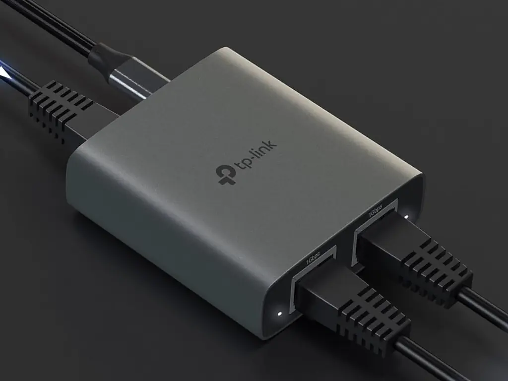 Square device with four cables protruding.