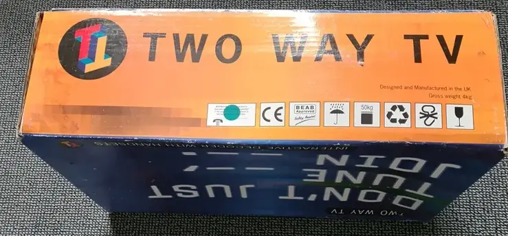 Orange box with regulatory logos.