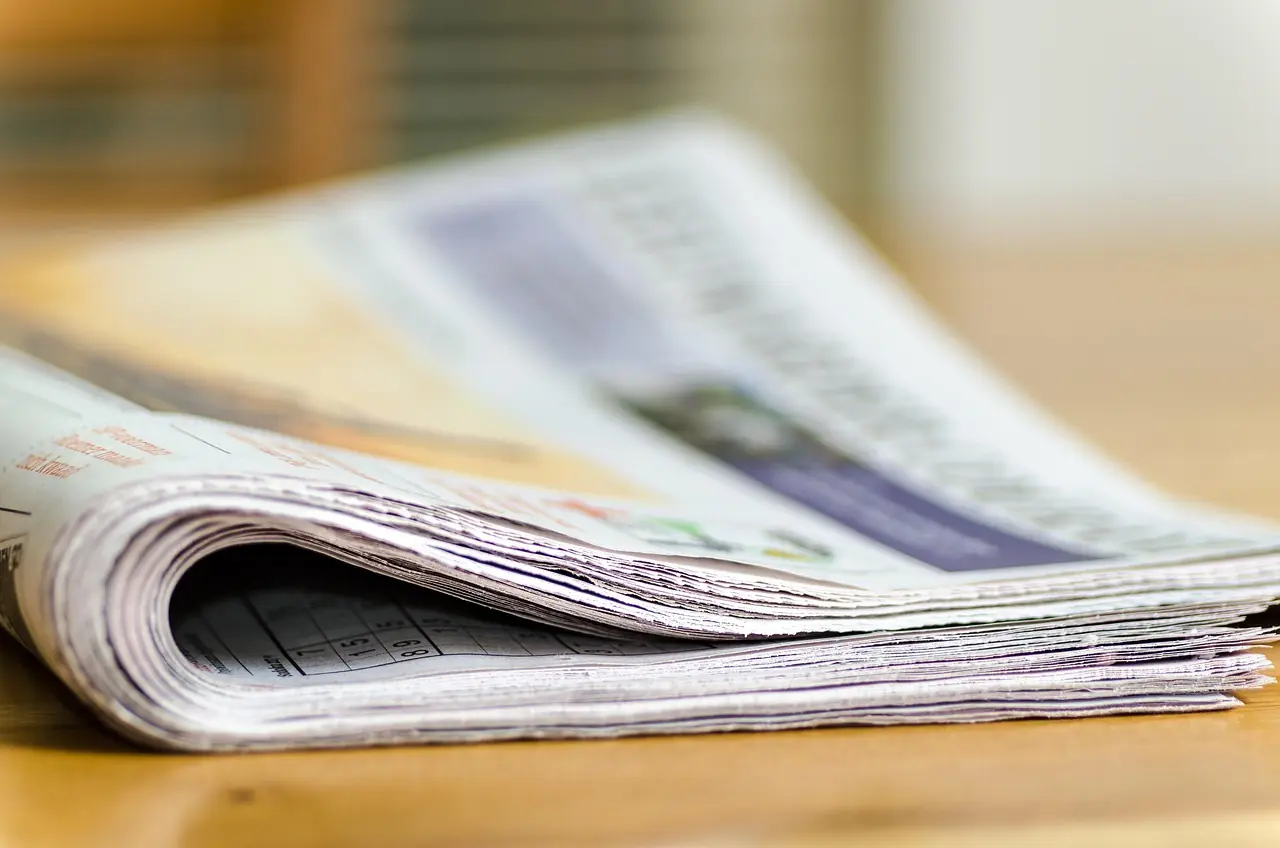 Folded newspapers. Image by Andrys Stienstra from Pixabay.