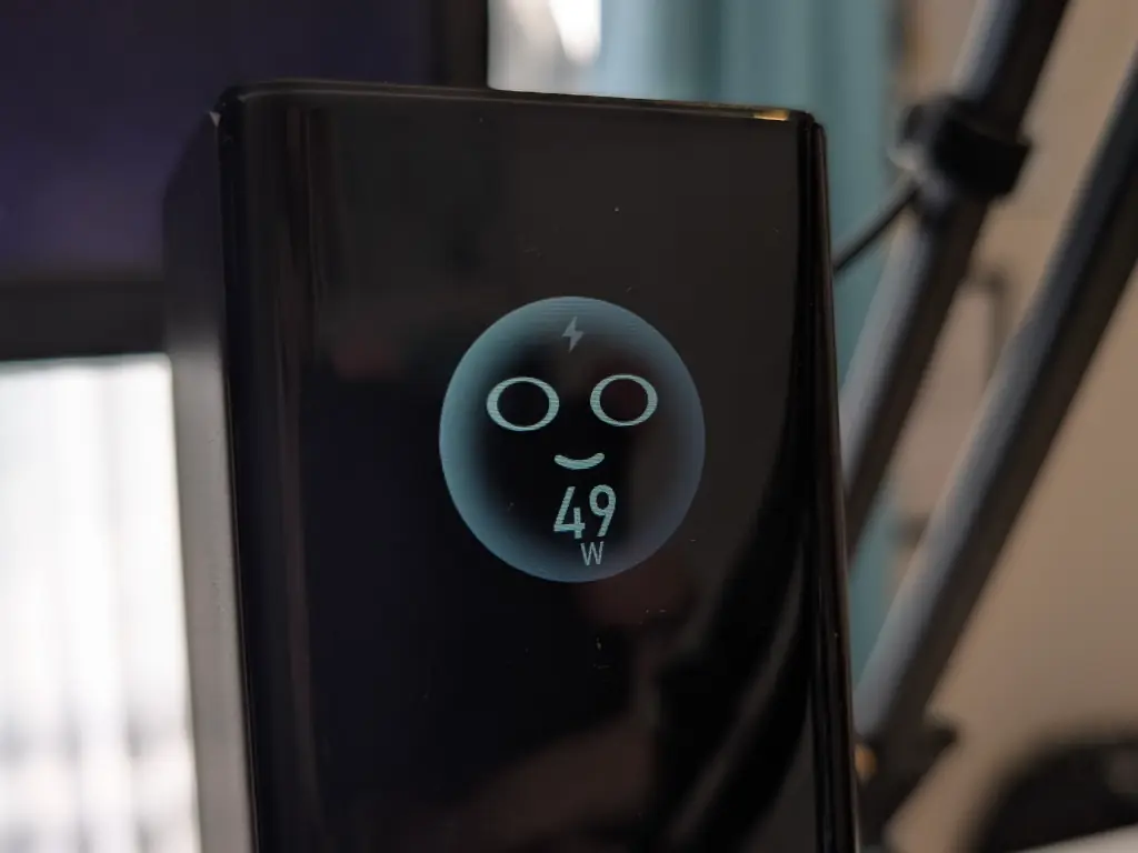 A weird smiley face showing 49 Watts.