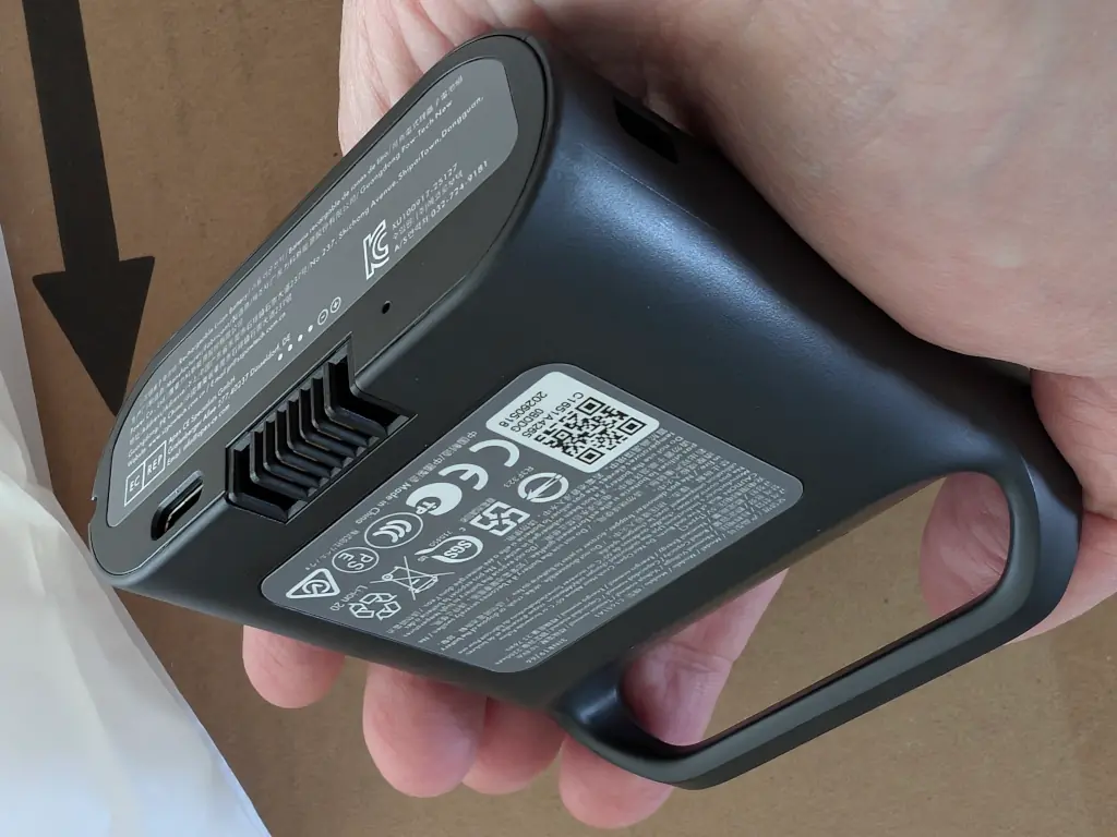 A battery pack with a handle.