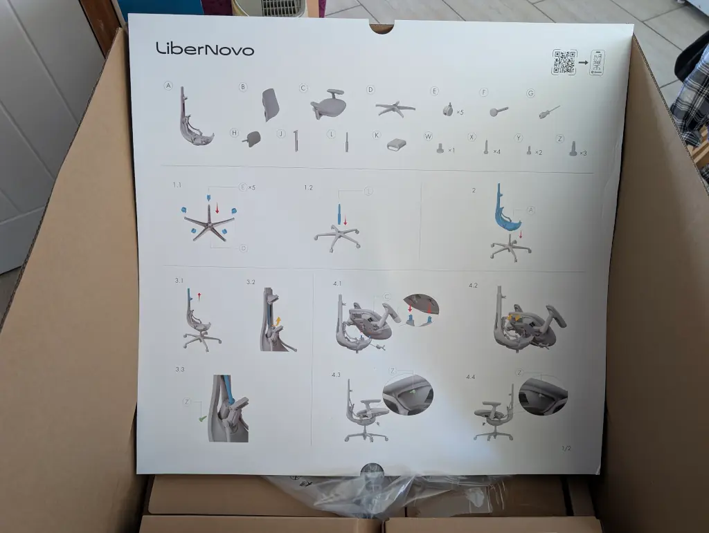 Massive instructions on a big bit of card printed in colour.